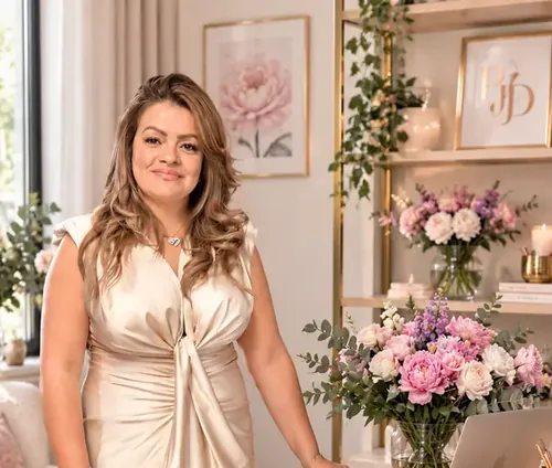 Paula Andrea in her flower studio with the PJD monogram